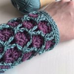 Odette Crochet Wrist Warmers. Crafted in burgundy and teal in a honey comb lattice work design || thecrochetspace.com