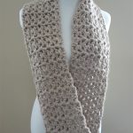 Pavement Crocheted Infinity Scarf. Crafted in an oatmeal color and left to hang down || thecrochetspace.com