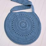River Ripples Crochet Bag. Round Bag with long shoulder strap crafted in blue || thecrochetspace.com
