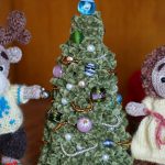 Seasonal Crochet Plush Tree. Crafted in green velvet and decorated with 2 characters either side || thecrochetspace.com
