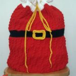 Seasonal Santa Crochet Sack. Large red sack with black and gold belt and buckle || thecrochetspace.com