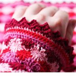 Stylish Crocheted Catherine Wrist Warmers. One wrist warmer crafted in various shades of red || thecrochetspace.com