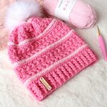 Sweetest Pea Crochet Slouch. Beanie crafted in Pink with white camel stitch and white pom pom || thecrochetspacecom