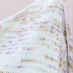 Tunisian Tri Crochet Shawl. Close up of shawl. || thecrochetspace.com