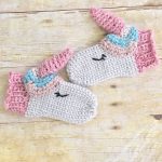 Unique Unicorn Crochet Mittens. Face on grey mittens || thecrochetspace.com