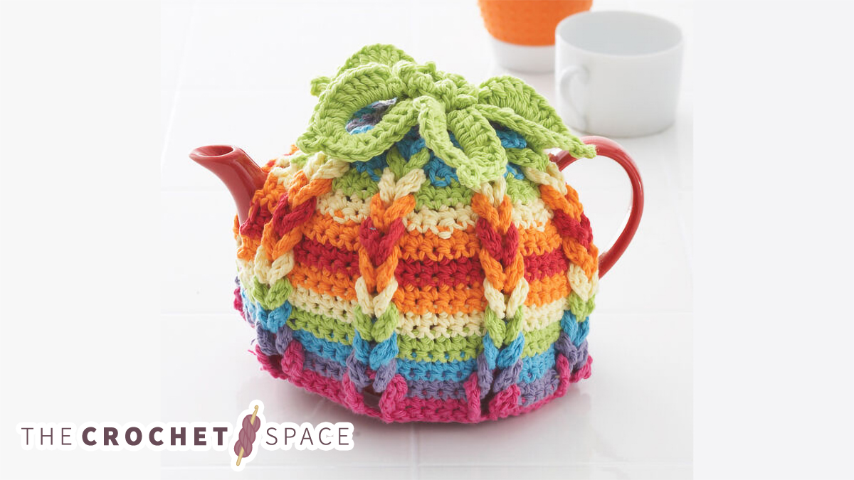 vibrant hibiscus crocheted tea cozy || editor