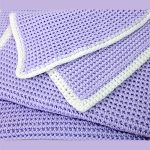 Waffle Weave Crocheted Baby Blanket. Crafted in waffle weave. Lilac with white edging || thcerochetspace.com