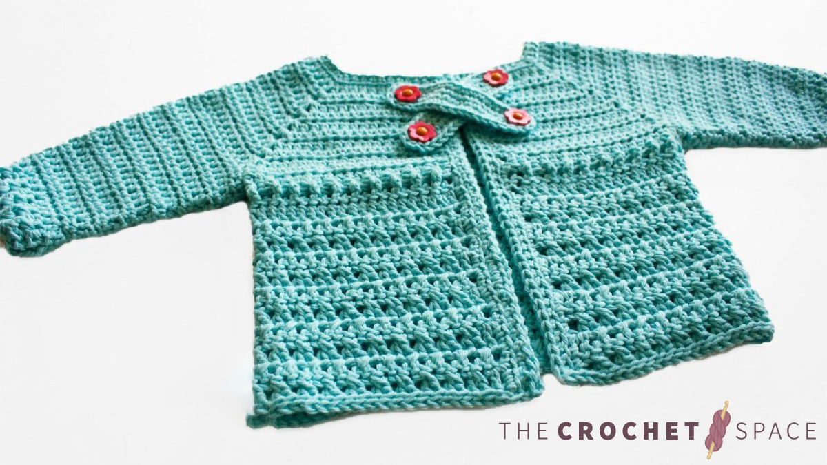 X Stitch Crocheted Baby Cardigan || thecrochetspace.com