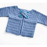 X Stitch Crocheted Baby Cardigan. Crafted in light blue || thecrochetspace.com